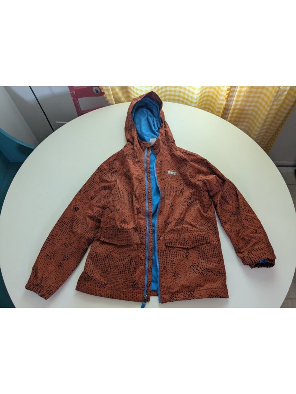 REI Co-op Boys Sz M 10-12 Kids Rain Jacket Raincoat Orange Print Hood Lined EUC